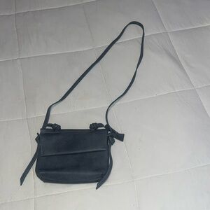 By Anthropologie blue vegan leather small crossbody bag 
EUC! Like new